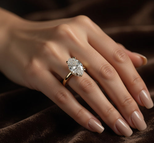 2ct Marquise Cut Hidden Halo Lab Grown Diamond Engagement Ring on a hand 