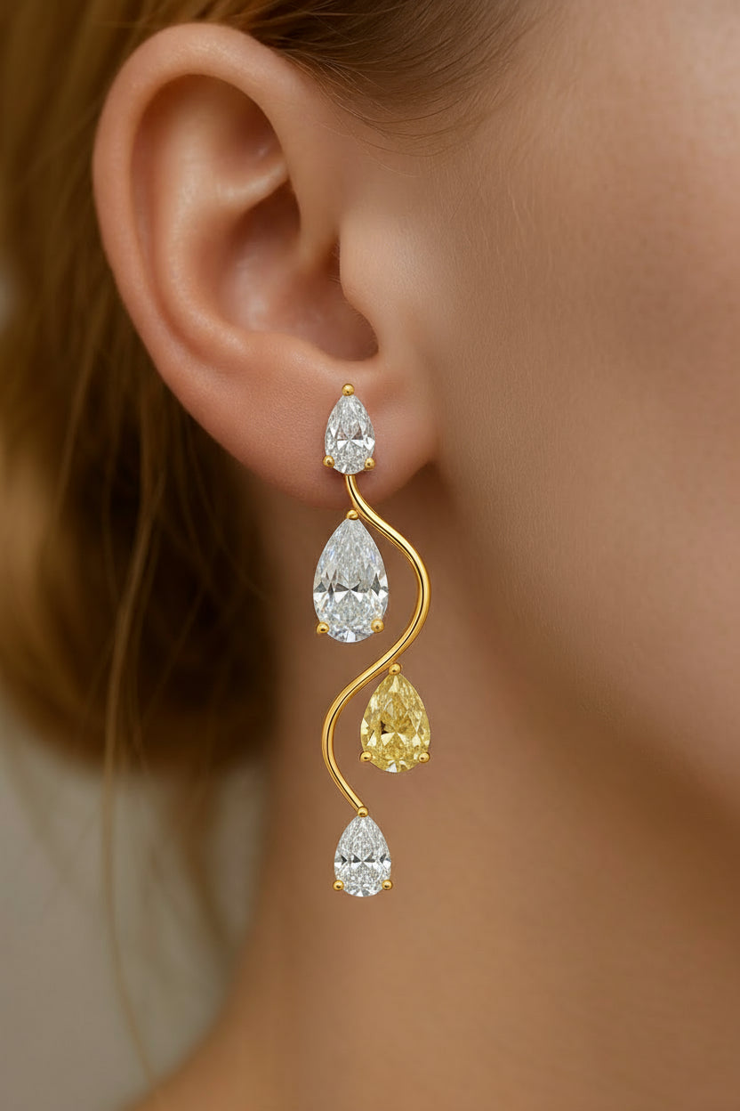 Golden Wave Pear Drop Earrings � White & Yellow Diamond Elegance image 1