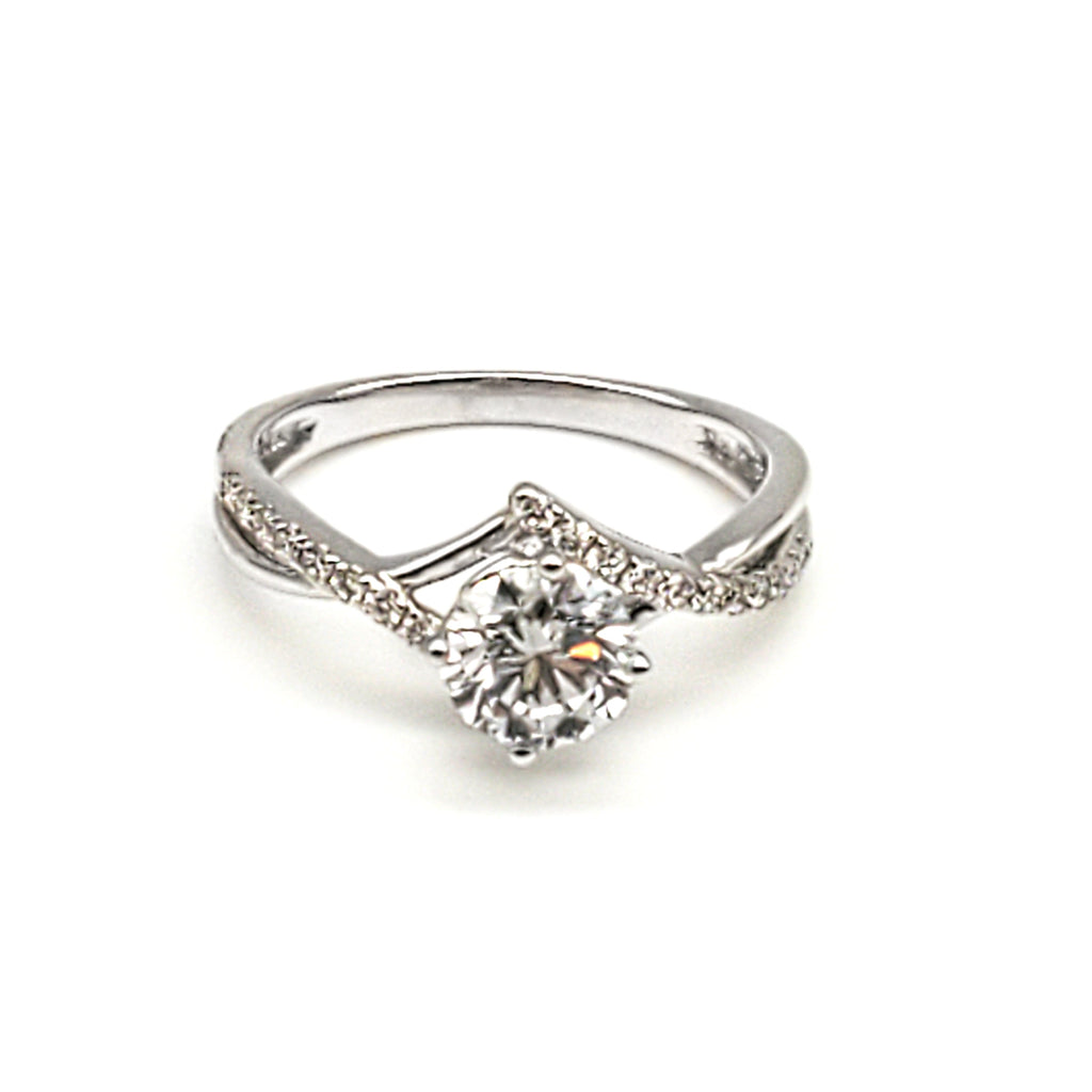 Criss Cross Micro Pavé Diamond Engagement Gold Ring flat lay on white surface