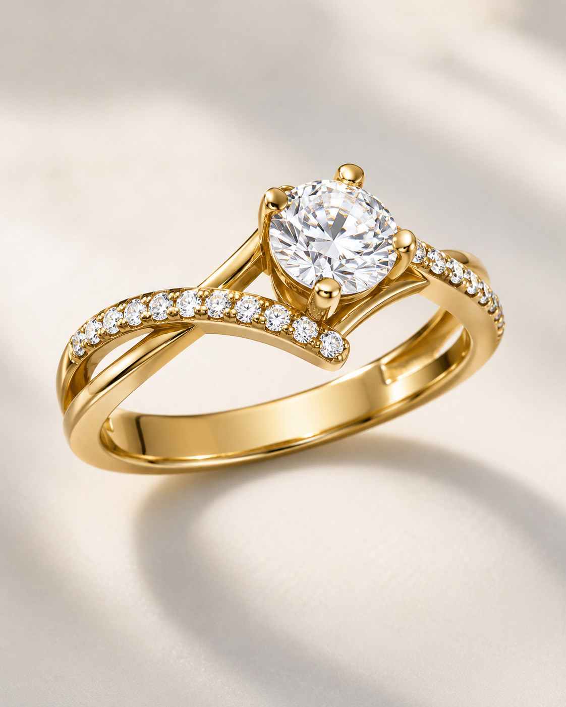 Criss Cross Micro Pavé Diamond Engagement Gold Ring with large diamond and smaller diamonds on the band