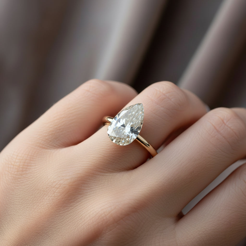 Solitaire Pear-Cut Diamond Engagement Ring image 0